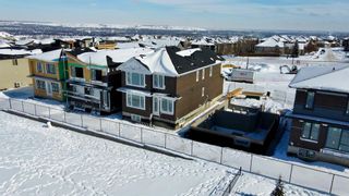 Photo 5: 60 Coulee Crescent SW in Calgary: Cougar Ridge Detached for sale : MLS®# A2029717