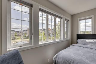 Photo 22: 9 Quarry Gate SE in Calgary: Douglasdale/Glen Row/Townhouse for sale : MLS®# A2053745