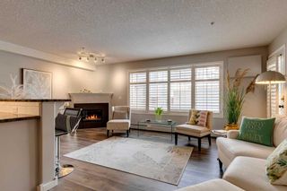 Main Photo: 117 6868 Sierra Morena Boulevard SW in Calgary: Signal Hill Apartment for sale : MLS®# A2110249