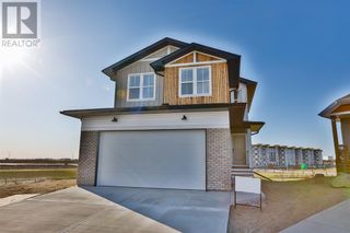 Photo 1: 519 Greywolf Cove N in Lethbridge: House for sale : MLS®# A1188854