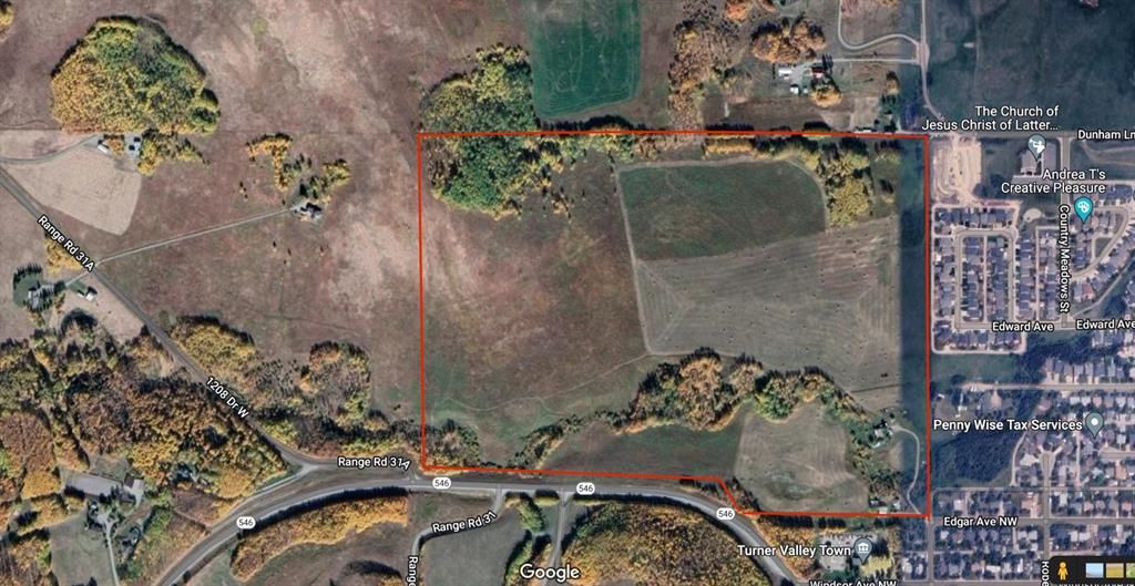 Main Photo: 510 EDGAR Avenue NW: Rural Foothills County Commercial Land for sale : MLS®# A1208448