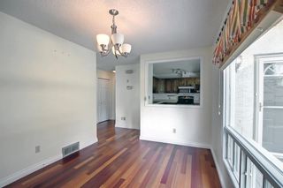 Photo 7: 130 Strathlorne Mews SW in Calgary: Strathcona Park Row/Townhouse for sale : MLS®# A1252004