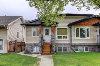 Photo 1: 7408 21A Street SE in Calgary: Ogden Semi Detached (Half Duplex) for sale : MLS®# A2051623