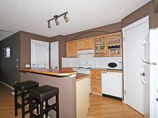 Photo 10: 100 PRESTWICK Avenue SE in Calgary: McKenzie Towne House for sale : MLS®# C4171620