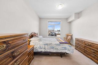 Photo 14: 203 132 1 Avenue NW: Airdrie Apartment for sale : MLS®# A2122808