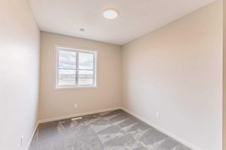 Photo 19: 212 Hotchkiss Drive in Calgary: C-385 Semi Detached (Half Duplex) for sale : MLS®# A2122668