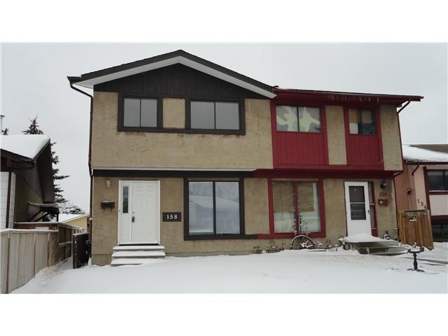 Main Photo: 158 ABALONE Place NE in CALGARY: Abbeydale Residential Attached for sale (Calgary)  : MLS®# C3558137