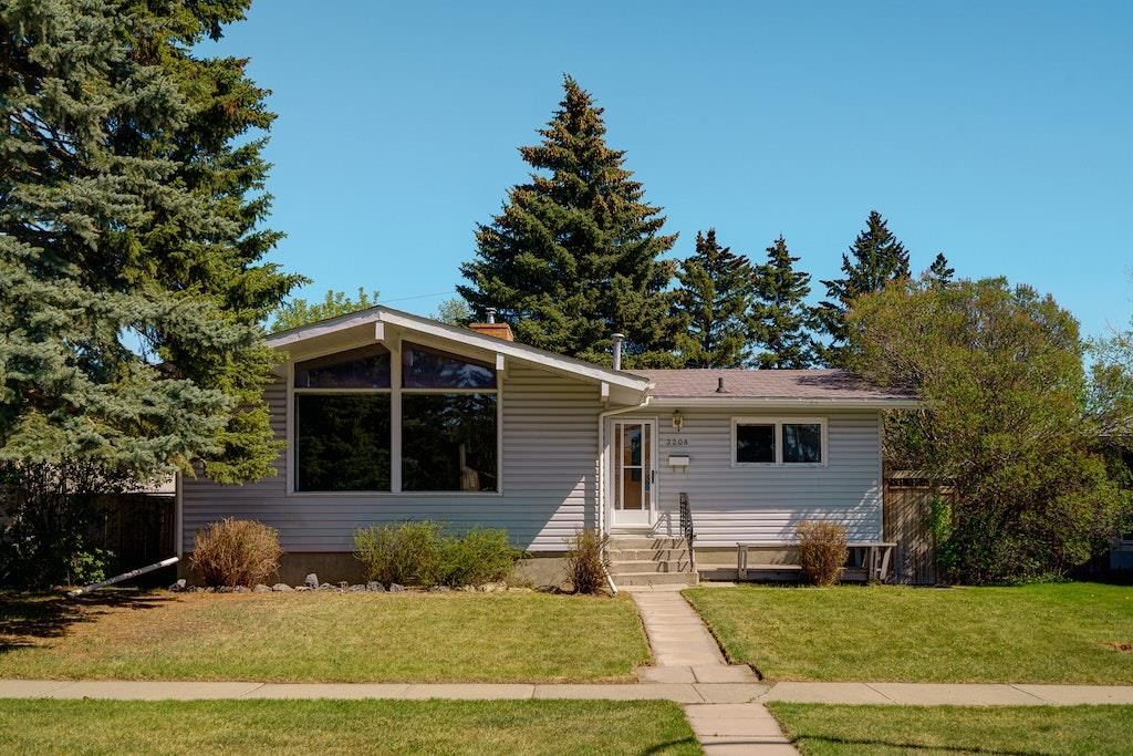 Located just one door from Confederation Park Golf Course this mid century bungalow is on a 50 ft lot and enjoys a distinct West Coast ambiance.