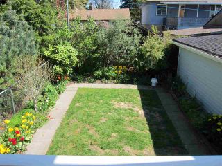Photo 16: 4656 RAVINE Street in Vancouver: Collingwood VE House for sale (Vancouver East)  : MLS®# R2107811