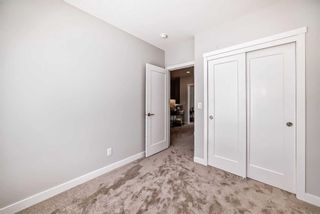 Photo 32: 408 Shawnee Square SW in Calgary: Shawnee Slopes Row/Townhouse for sale : MLS®# A2117182