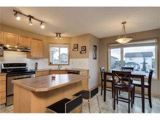Photo 4: 1718 THORBURN Drive SE: Airdrie House for sale : MLS®# C4096360