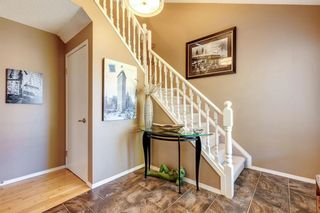 Photo 5: 102 Somervale Point SW in Calgary: Somerset Row/Townhouse for sale : MLS®# A2088078
