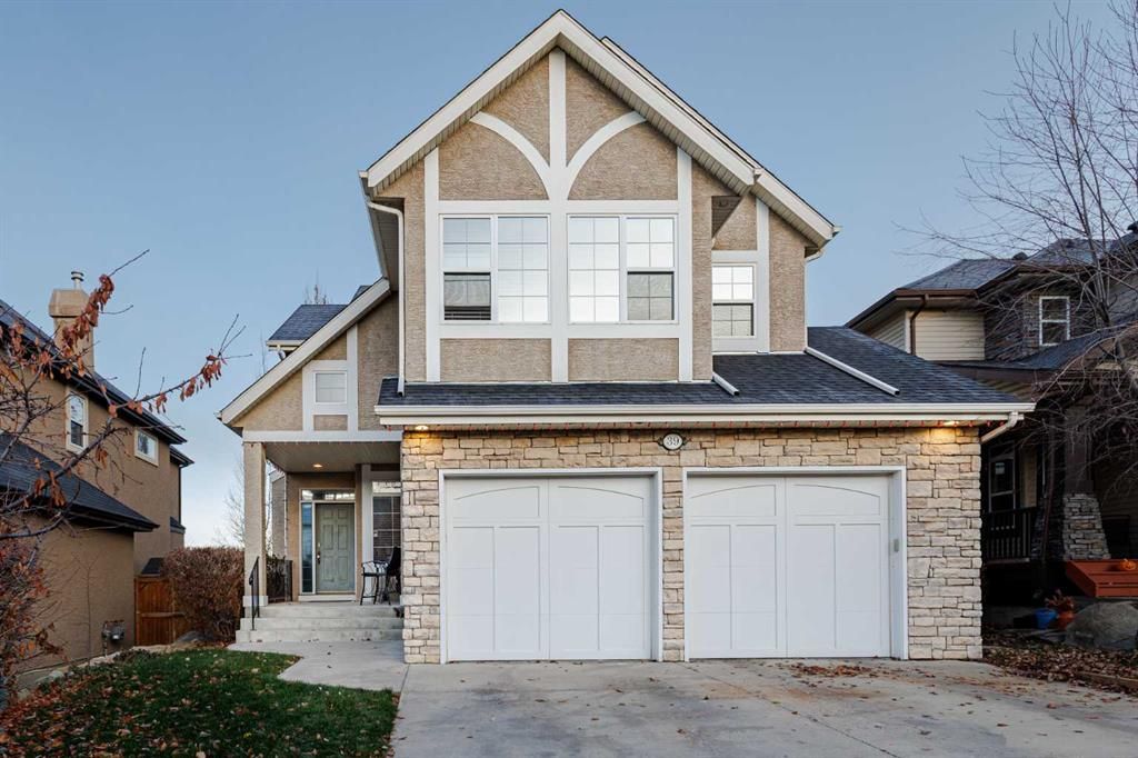 Main Photo: 39 Crestridge Way SW in Calgary: Crestmont Detached for sale : MLS®# A2092668