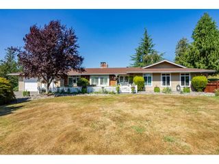 Photo 1: 4164 GLENMORE Road in Abbotsford: Matsqui House for sale : MLS®# R2297861
