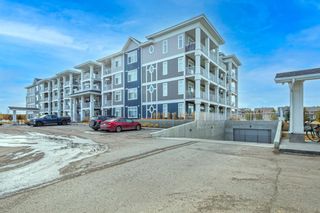 Photo 1: 114 300 Auburn Meadows Common SE in Calgary: Auburn Bay Apartment for sale : MLS®# A1195615