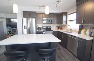 Photo 5: 324 REDSTONE View NE in Calgary: Redstone Row/Townhouse for sale : MLS®# A1186611