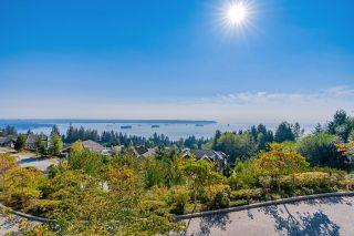 Photo 2: 101 2575 GARDEN Court in West Vancouver: Whitby Estates Townhouse for sale in "AERIE II" : MLS®# R2764545