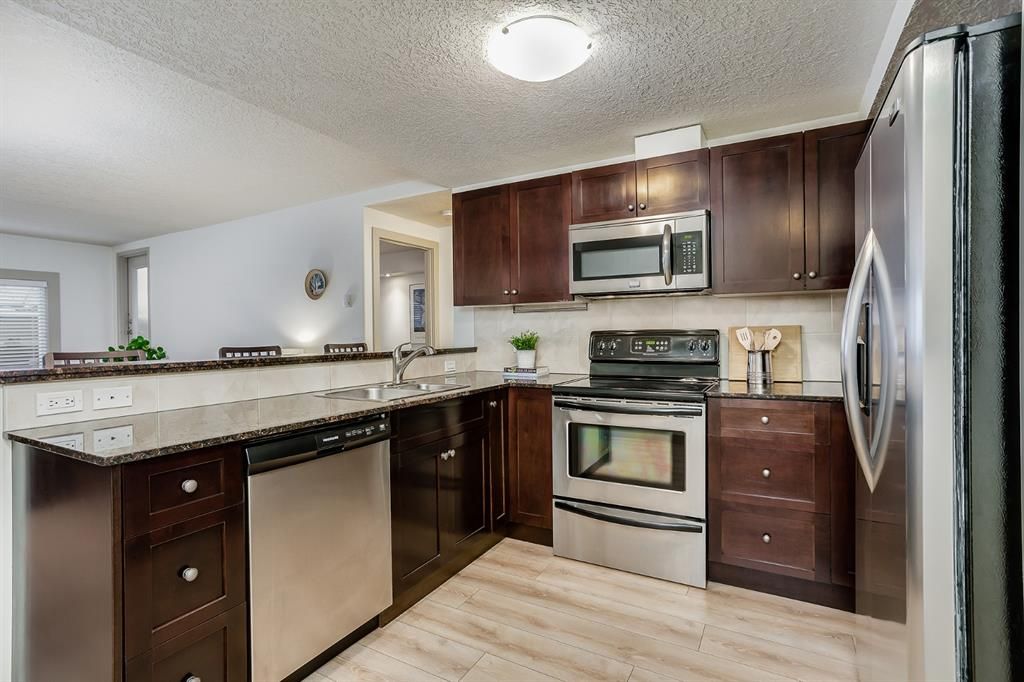 Photo 7: Photos: 106 728 3 Avenue NW in Calgary: Sunnyside Apartment for sale : MLS®# A1061819