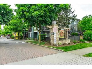 Photo 1: 100 15236 36 Avenue in Surrey: Morgan Creek Townhouse for sale in "Sundance" (South Surrey White Rock)  : MLS®# R2591704