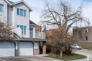 Main Photo: 2 1604 27 Avenue SW in Calgary: South Calgary Row/Townhouse for sale : MLS®# A2123568