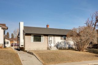 Photo 1: 312 Greenfield Road NE in Calgary: Greenview Full Duplex for sale : MLS®# A2047329