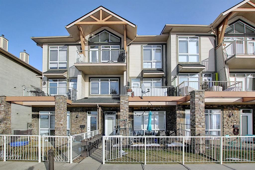 Main Photo: 19 117 Rockyledge View NW in Calgary: Rocky Ridge Row/Townhouse for sale : MLS®# A1061525