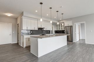 Photo 13: 410 4250 Seton Drive SE in Calgary: Seton Apartment for sale : MLS®# A1140732
