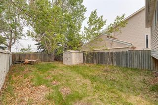 Photo 3: 92 Strandell Crescent SW in Calgary: Strathcona Park Detached for sale : MLS®# A2049782