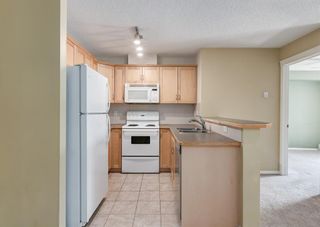 Photo 11: 1211 70 Panamount Drive NW in Calgary: Panorama Hills Apartment for sale : MLS®# A2054811