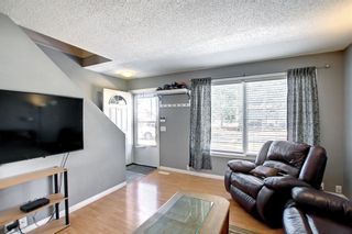 Photo 4: 25 999 Canyon Meadows Drive SW in Calgary: Canyon Meadows Row/Townhouse for sale : MLS®# A1223653