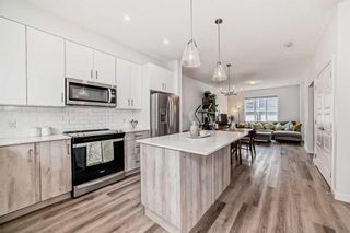 Photo 6: 203 137 Red Embers Link NE in Calgary: Redstone Row/Townhouse for sale : MLS®# A2124972
