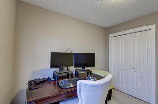 Photo 25: 179 Fireside Parkway: Cochrane Row/Townhouse for sale : MLS®# A1259498