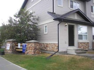 Photo 2: 501 Saddlecrest Boulevard NE in Calgary: Saddle Ridge Row/Townhouse for sale : MLS®# A2090686