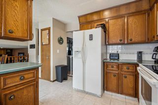 Photo 11: 44 Woodbrook Place SW in Calgary: Woodbine Detached for sale : MLS®# A2127974