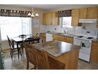 Photo 8: 28 WOODSIDE Road NW: Airdrie Residential Detached Single Family for sale : MLS®# C3510905