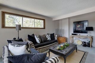 Photo 8: 7 Coach Manor Rise SW in Calgary: Coach Hill Detached for sale : MLS®# A2049271
