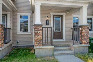 Photo 4: 1438 148 Avenue NW in Calgary: Carrington Row/Townhouse for sale : MLS®# A2143616