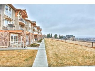Photo 13: 1 169 Rockyledge View NW in Calgary: Rocky Ridge Row/Townhouse for sale : MLS®# A1241867