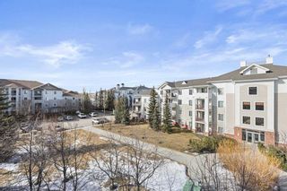 Main Photo: 406 17 Country Village Bay NE in Calgary: Country Hills Village Apartment for sale : MLS®# A2115266