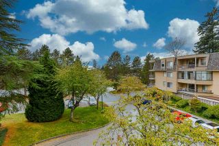 Photo 1: 201 1740 SOUTHMERE Crescent in Surrey: Sunnyside Park Surrey Condo for sale in "Capstan Way: Spinnaker II" (South Surrey White Rock)  : MLS®# R2526550