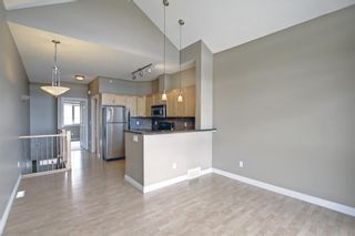 Photo 15: 14 140 Rockyledge View NW in Calgary: Rocky Ridge Row/Townhouse for sale : MLS®# A1199471