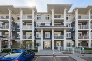 Photo 1: 405 200 Auburn Meadows Common SE in Calgary: Auburn Bay Apartment for sale : MLS®# A2131075