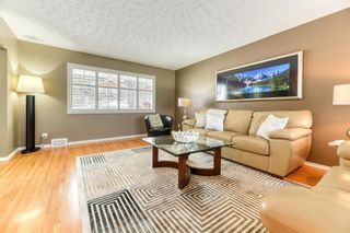 Photo 8: 91 Cumberland Drive NW in Calgary: Cambrian Heights Detached for sale : MLS®# A2020911