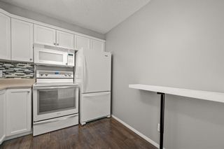Photo 12: 8214 304 Mackenzie Way SW: Airdrie Apartment for sale : MLS®# A1229593