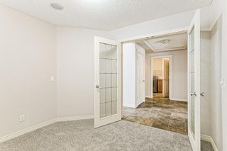 Photo 11: 12457 Crestmont Boulevard SW in Calgary: Crestmont Detached for sale : MLS®# A1203007