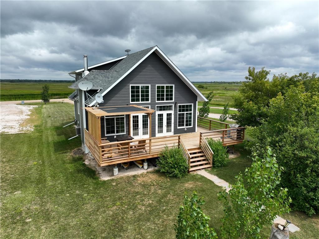 Main Photo: 199 Sugar Point Trail in Coldwell Rm: House for sale : MLS®# 202319799