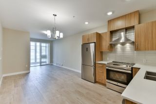 Photo 2: 213 2889 E 1ST Avenue in Vancouver: Renfrew VE Condo for sale in "FIRST & RENFREW" (Vancouver East)  : MLS®# R2377547