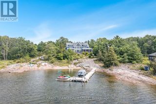 Photo 1: 220 KAMENNI BAY RD in Georgian Bay: House for sale : MLS®# X8229810