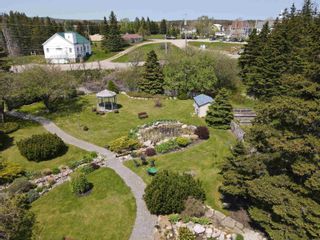 Photo 7: 36083 Cabot Trail Highway in Ingonish: 209-Victoria County / Baddeck Multi-Family for sale (Cape Breton)  : MLS®# 202312326