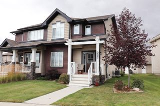 Photo 2: 120 Cy Becker BLVD in Edmonton: House Half Duplex for sale : MLS®# E4182256